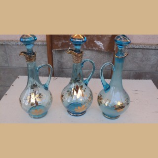 3 bottiglie di colore azzurro vecchie con pitttura in oro {20 euro luna }